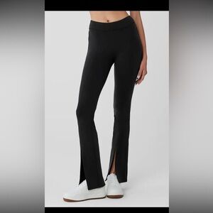 Alo Yoga Flutter Split Hem Flare Leggings in Black
